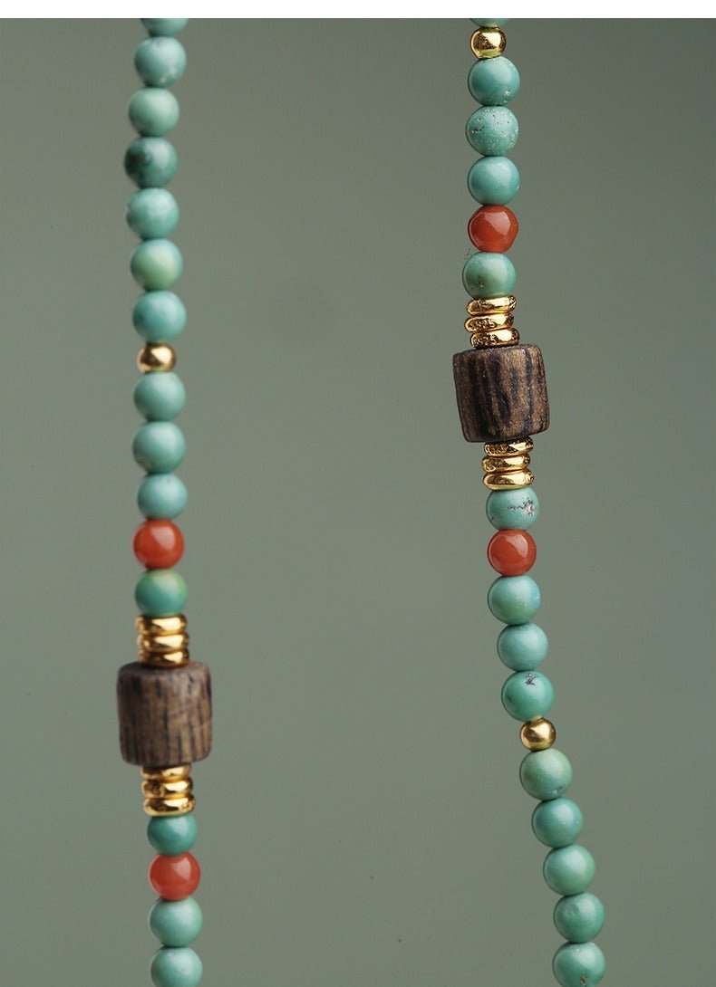 Turquoise agarwood necklace, millet beads, five - color lotus, Tibetan - style simple and niche design pendant in 42cm | Handmade Tibetan by Namtso Arte